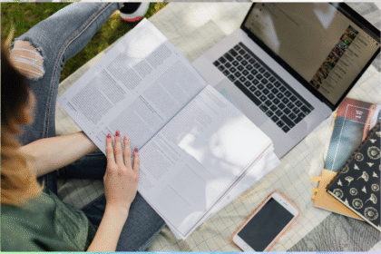 A girl studying with the help of student tools.
